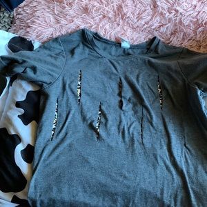 Top with cheetah display slits